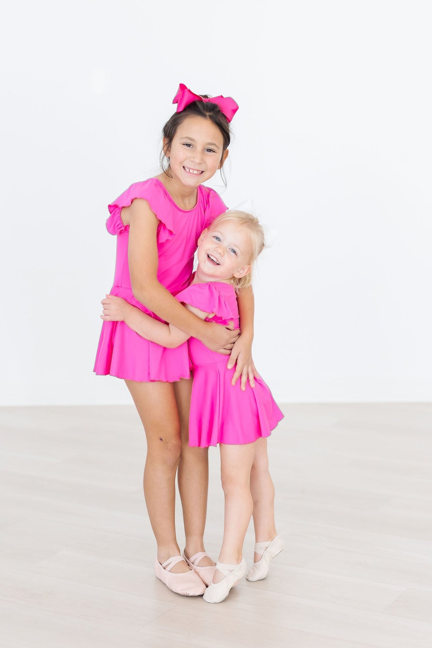 Mila & Rose ® Hot Pink S/S Twirl Leotard — side view