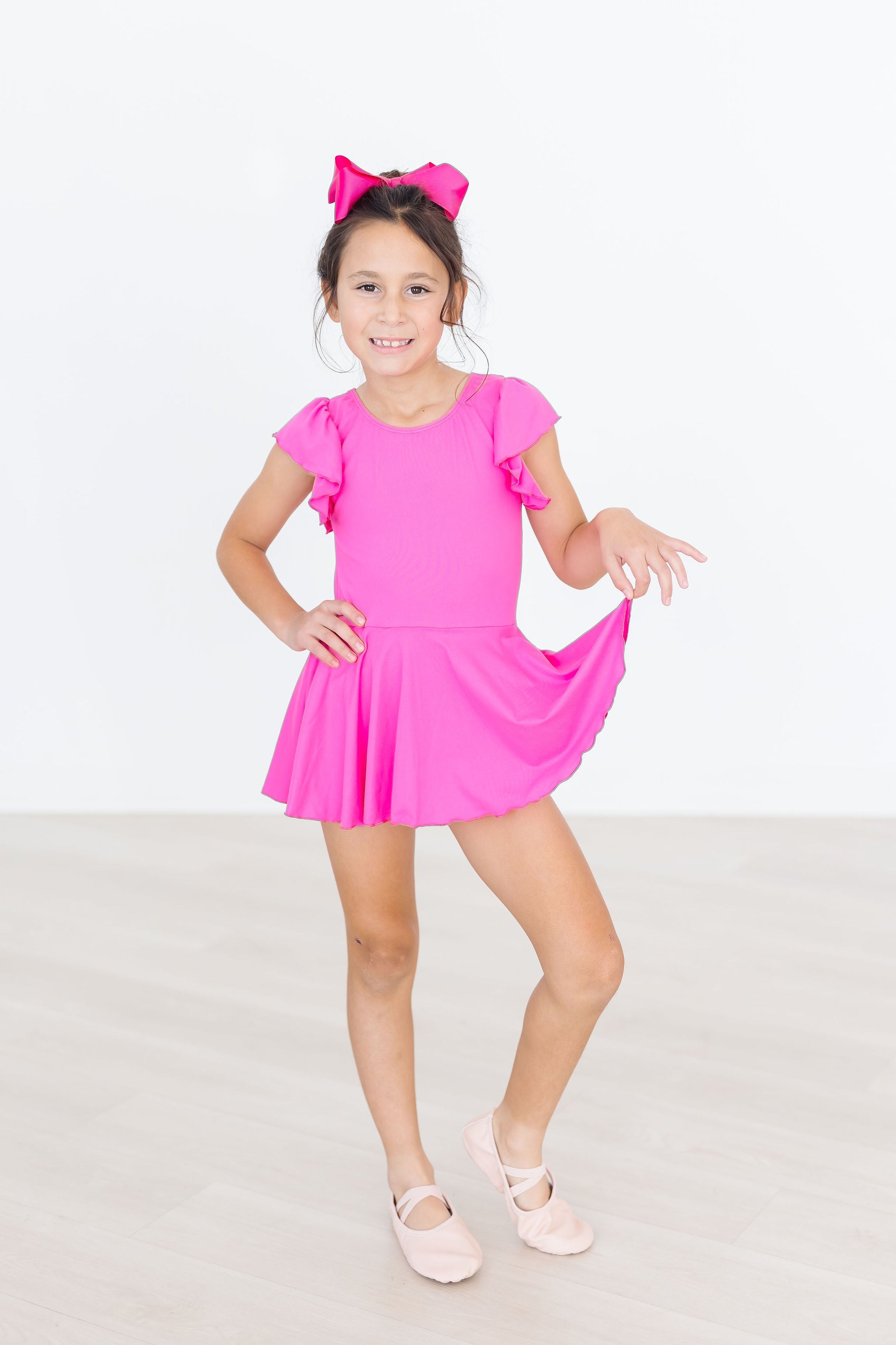 Mila & Rose ® Hot Pink S/S Twirl Leotard — back view