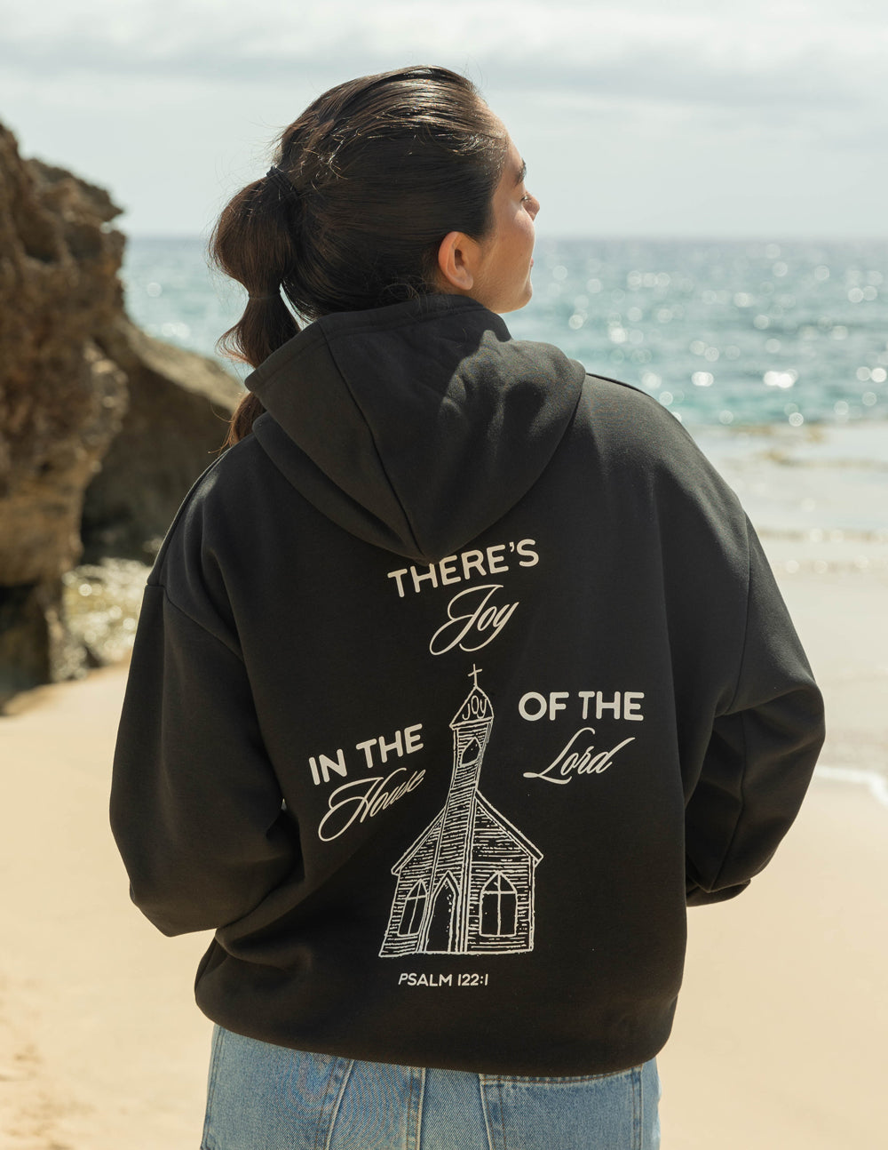 Elevated Faith House of the Lord Unisex Hoodie — lifestyle context