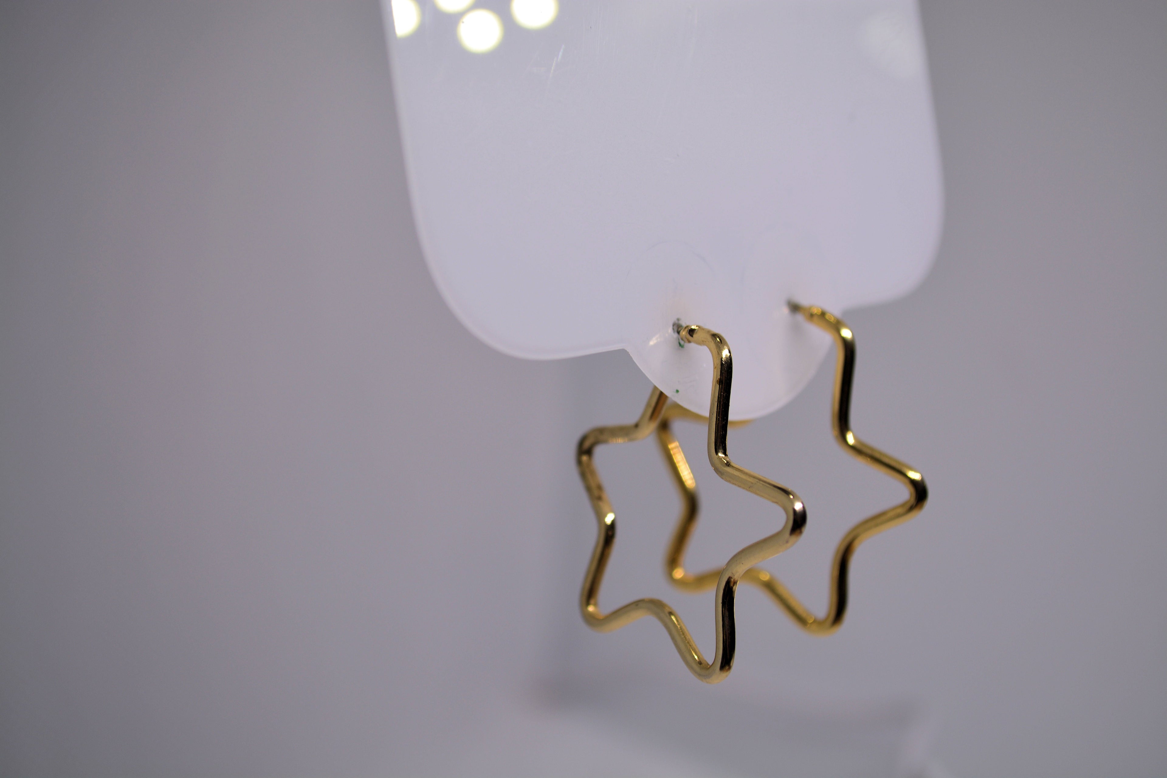 Just Neat Stuff Golden Star Earrings — side view
