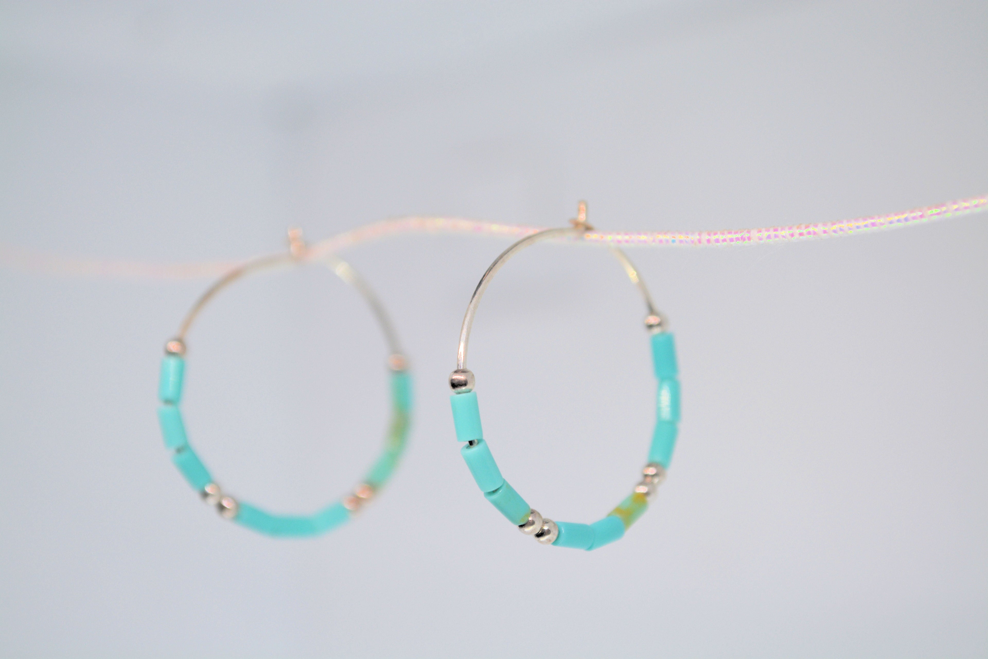 Just Neat Stuff Turquoise hoop earrings — side view