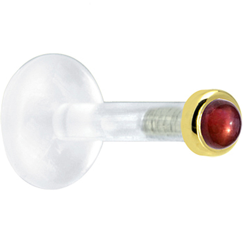 BodyCandy Solid 14K Yellow Gold 2mm Genuine Red Garnet Bioplast Push in Labret — detail close-up