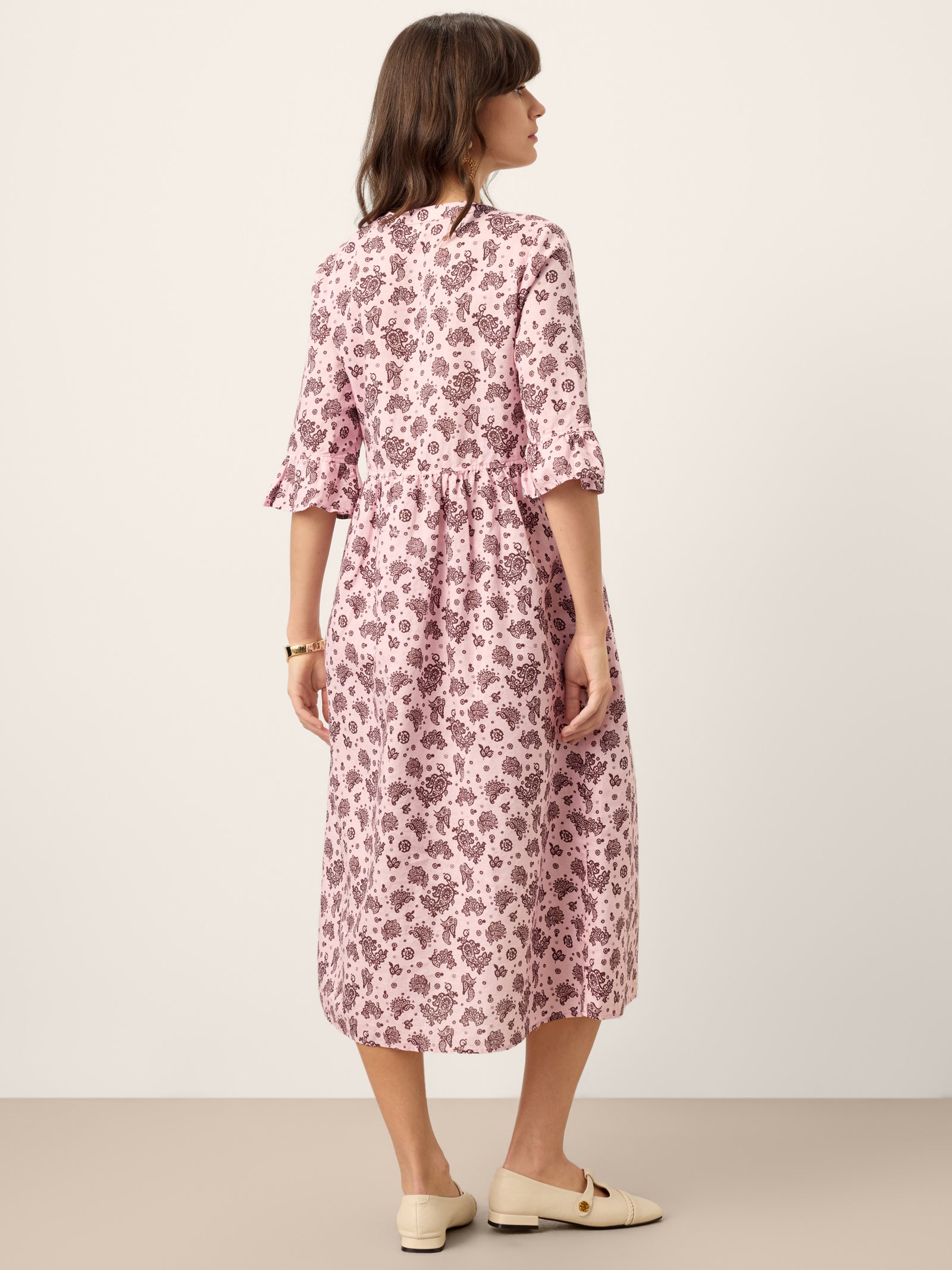 LINTICO Linen Paisley Pintucked Ruffle-Cuff Maxi Dress MAELYN — LINTICO branding close-up