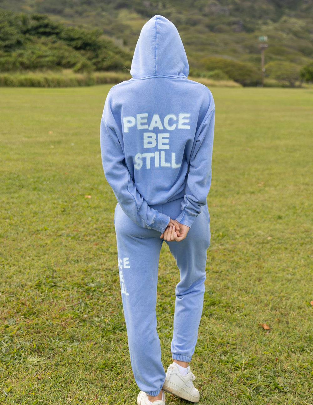 Elevated Faith Peace Be Still Unisex Hoodie — lifestyle context