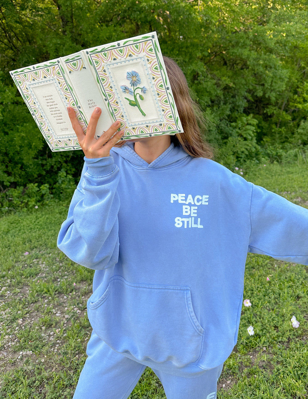 Elevated Faith Peace Be Still Unisex Hoodie — in-use photo