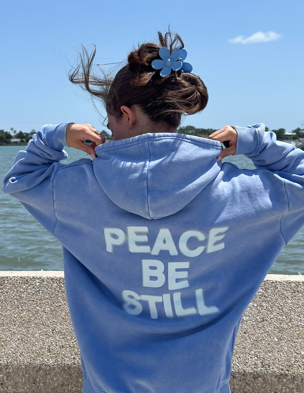 Elevated Faith Peace Be Still Unisex Hoodie — packaging