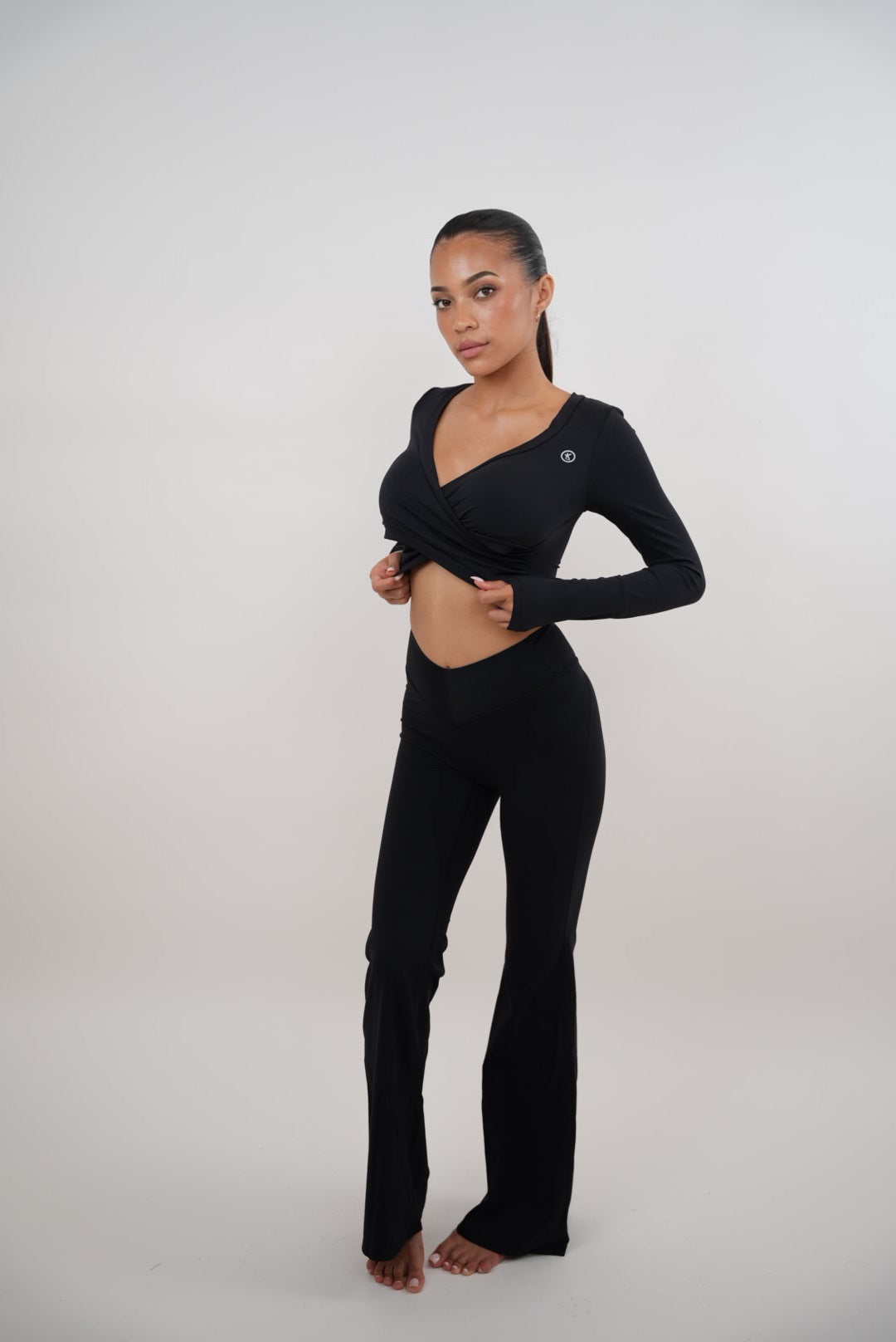 KIMITH BRAND I Am Present Black Stretch Flare Legging — in-use photo