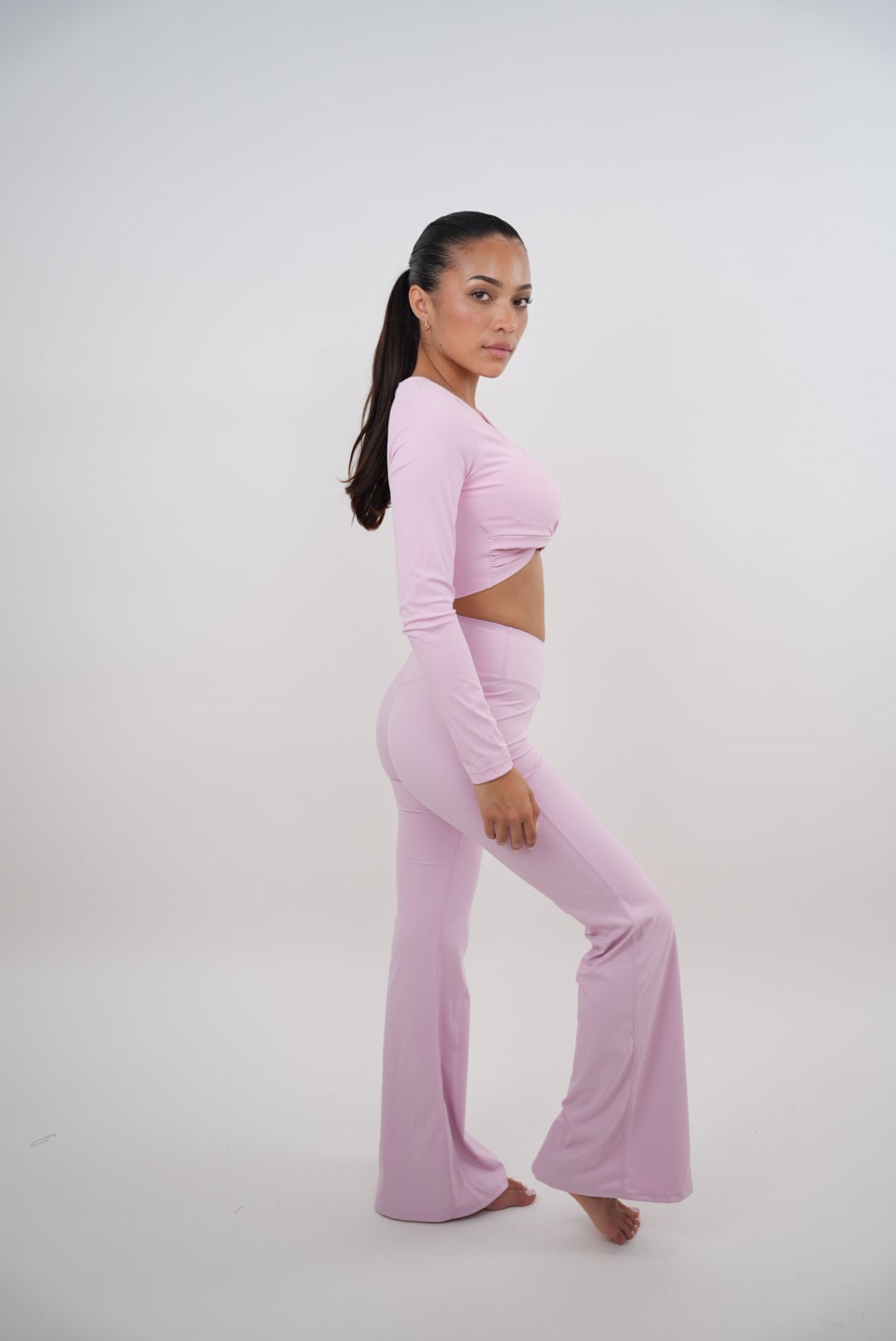 KIMITH BRAND I Am Present Pink Stretch Flare Legging — back view