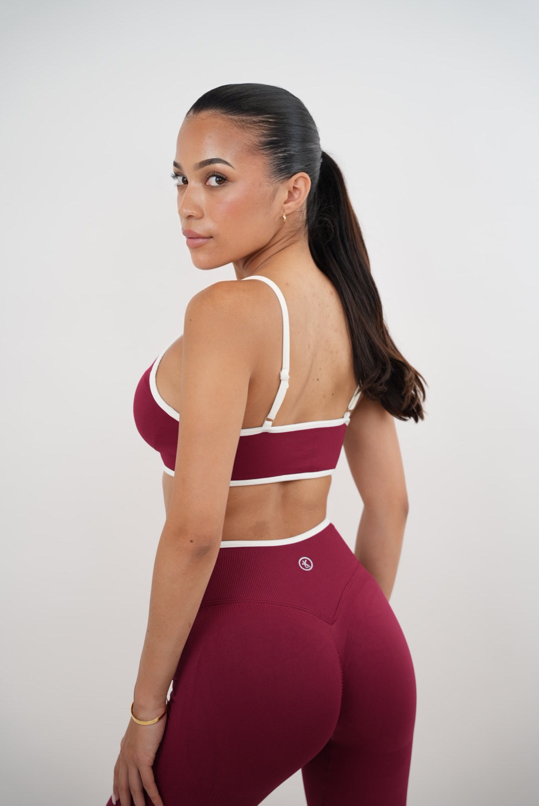 KIMITH BRAND Passion is Power Red Sports Bra — detail close-up
