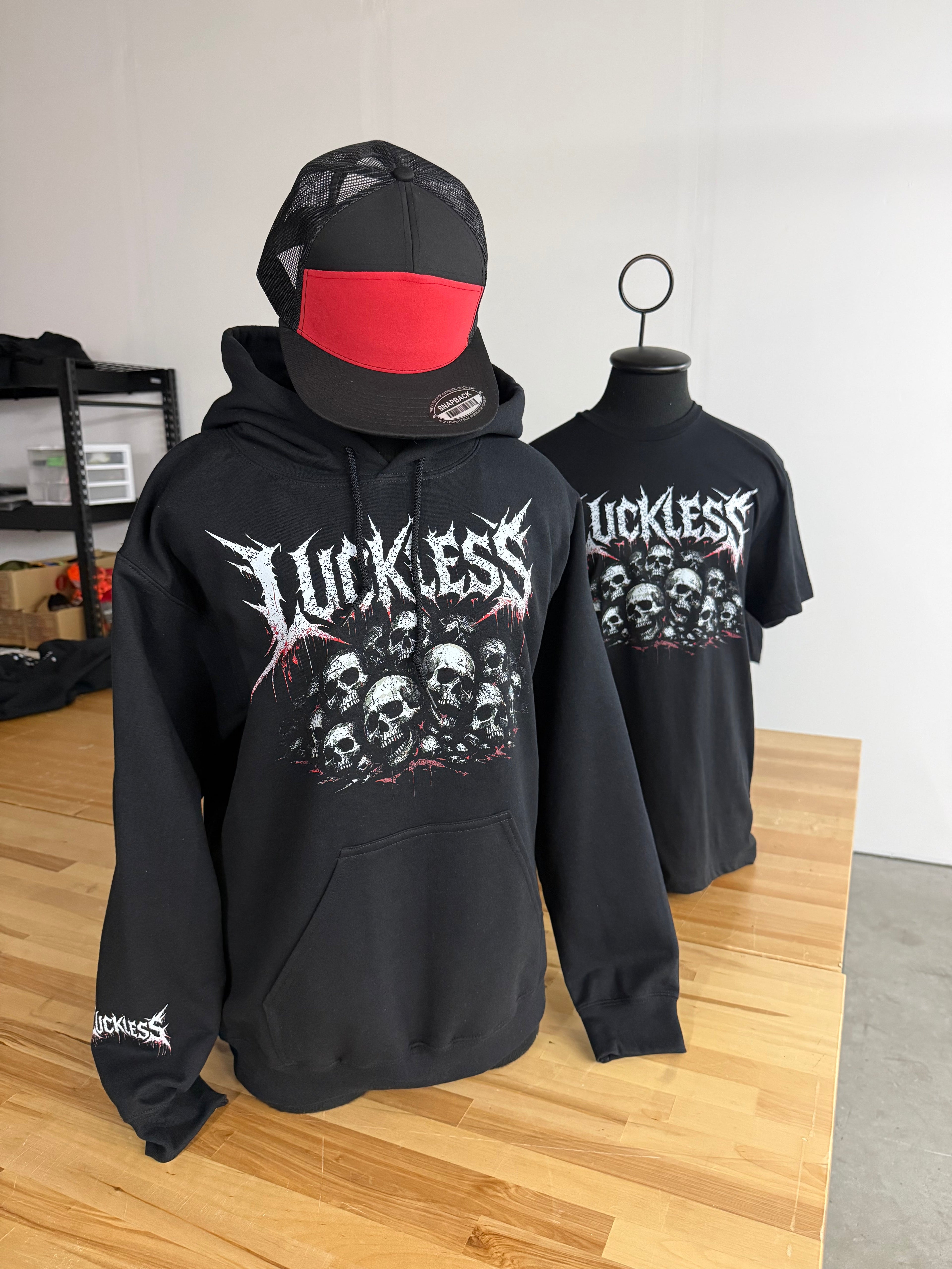 Luckless Outfitters Pile Of Skulls Hoodie — lifestyle context