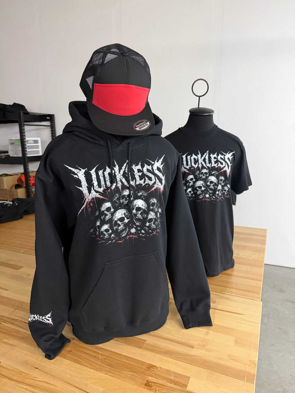 Luckless Outfitters Pile of Skulls Tee — size reference