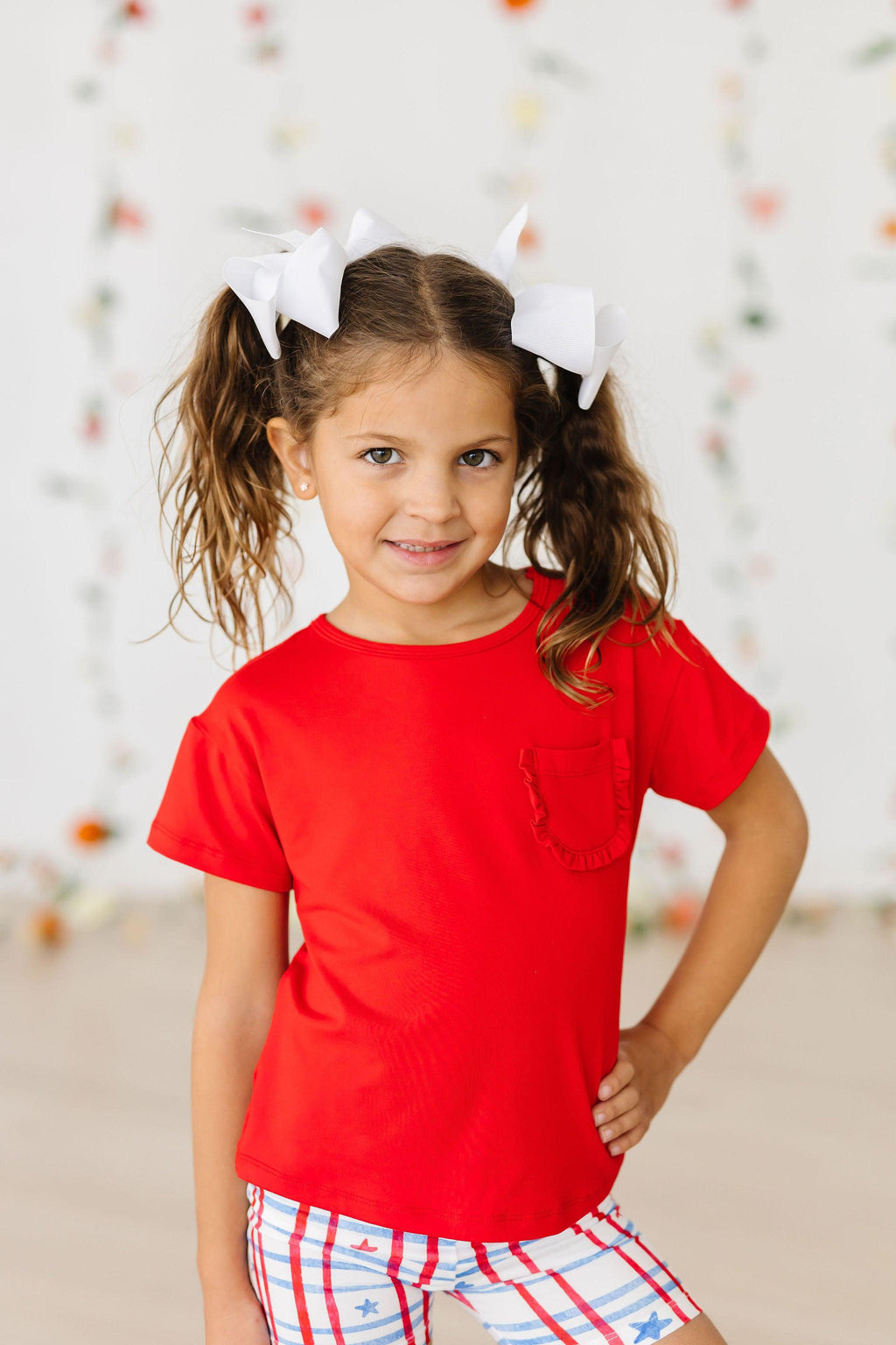 Mila & Rose ® Red Ruffle Pocket Tee — detail close-up