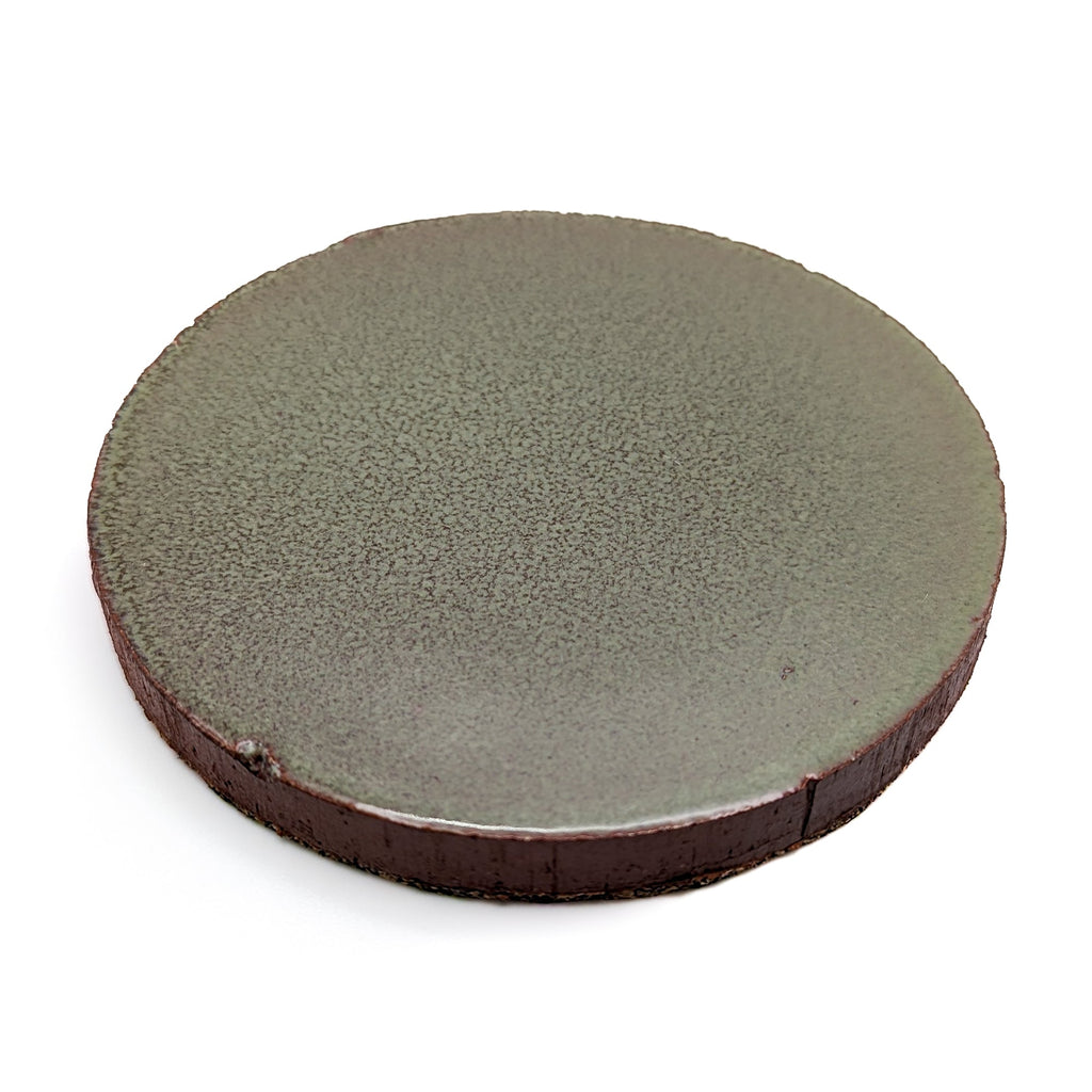 Bluecorn Candles Particular Tile Pillar Candle Base — branding close-up