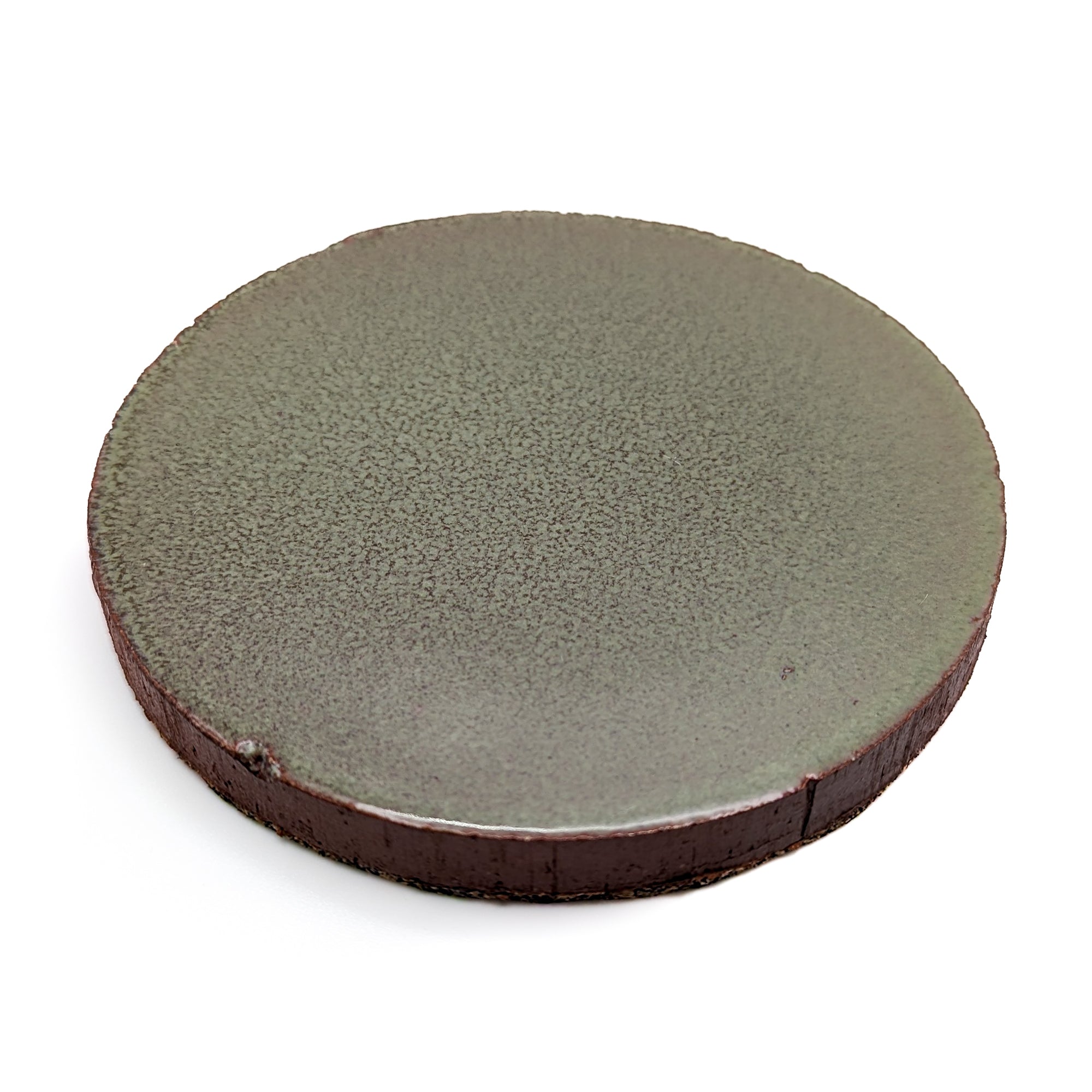 Bluecorn Candles Particular Tile Pillar Candle Base — branding close-up