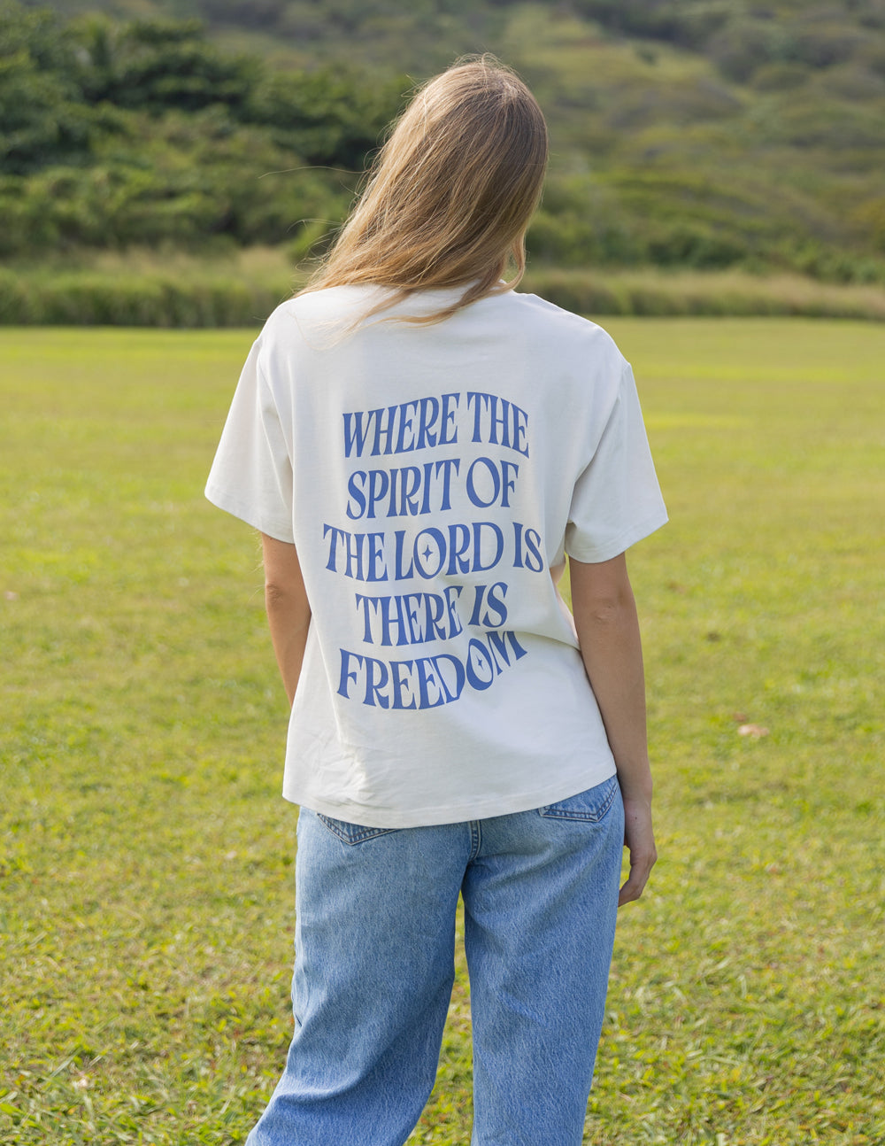 Elevated Faith Spirit of the Lord Unisex Tee — lifestyle context