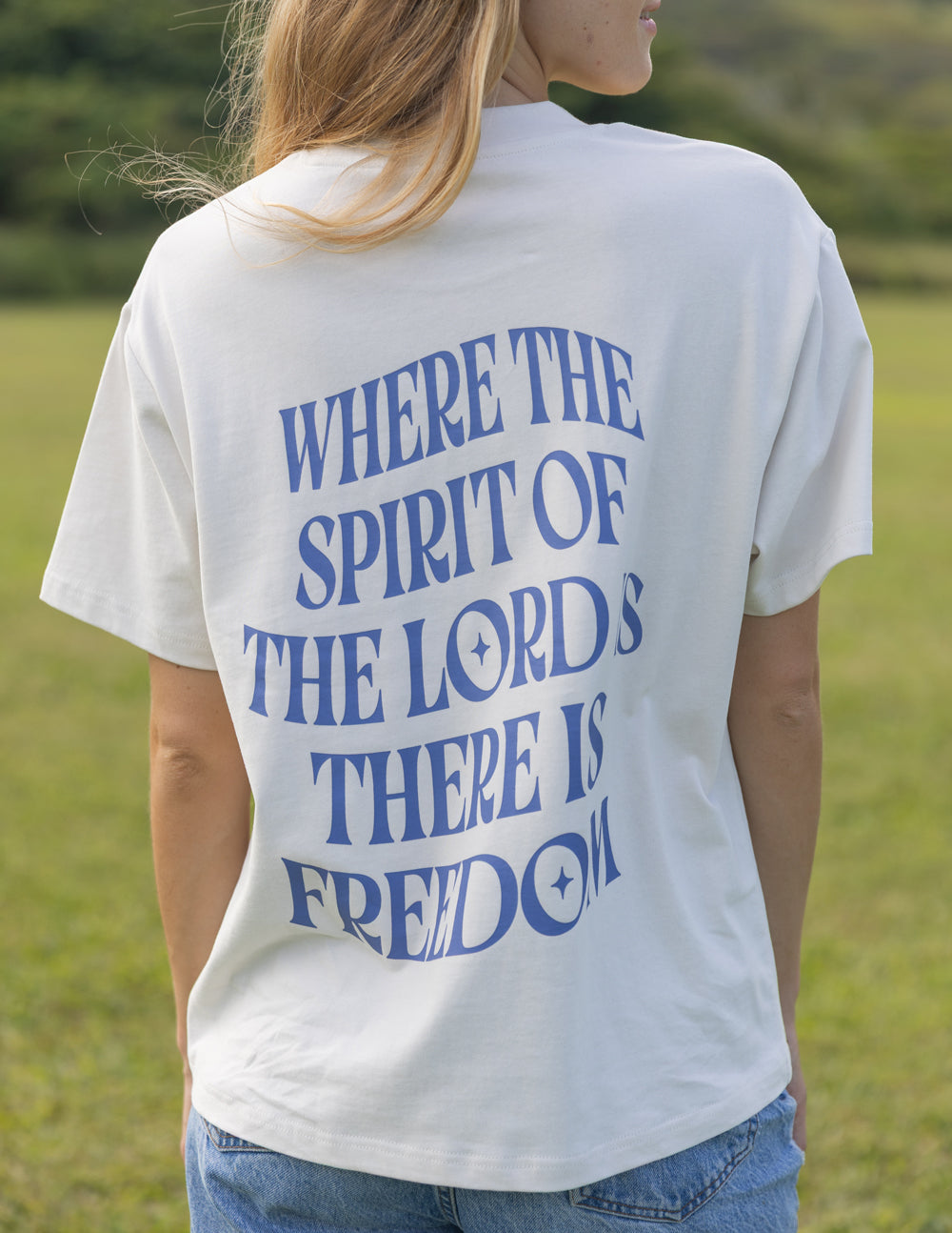Elevated Faith Spirit of the Lord Unisex Tee — side view