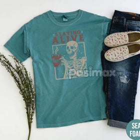'Staying Alive' Coffee Shirt – Skeleton Retro T-shirt, Funny Coffee Lovers Gift, Daily Grind Tee, Women's Comfort Colors Apparel