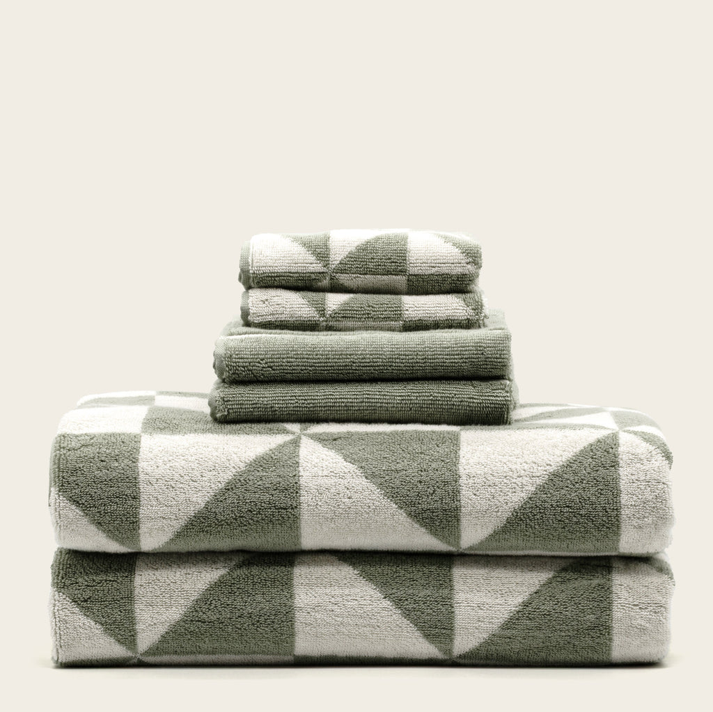 Italic Umbra Beach Towel — flat-lay composition