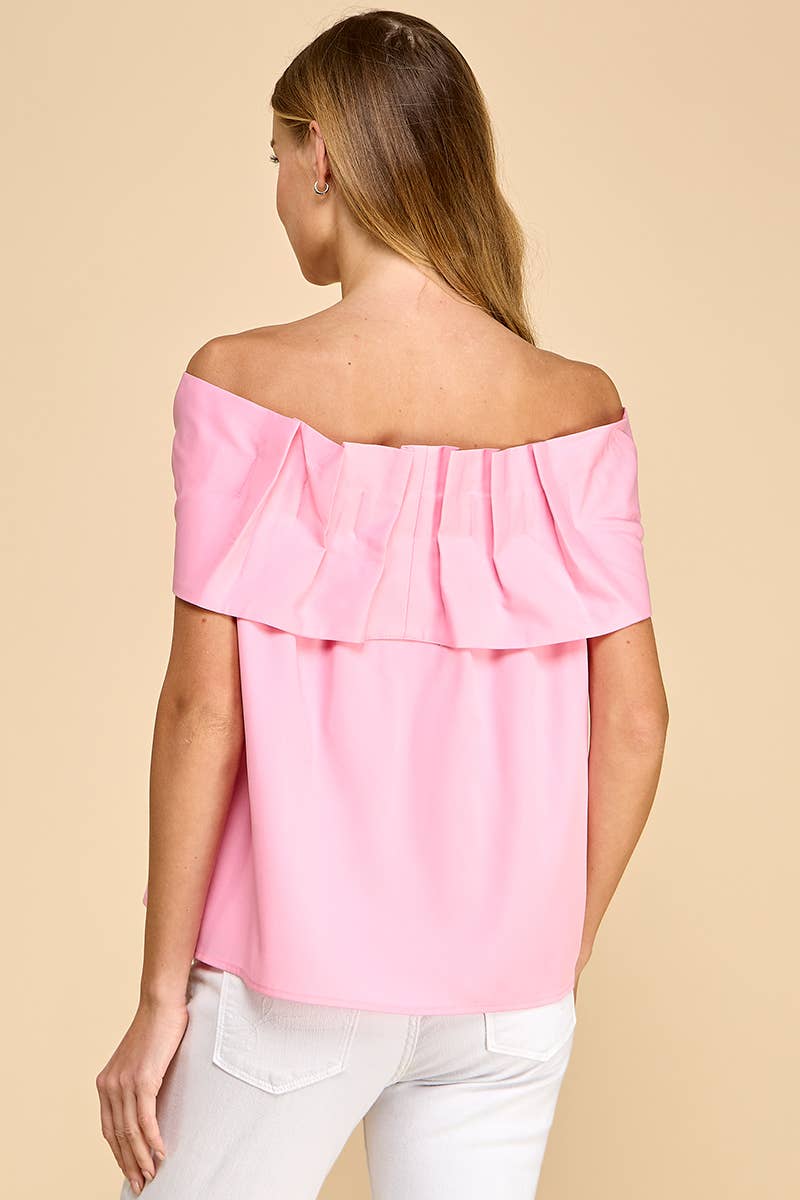 Pretty Little Patriot Pretty Little Patriot Pink Off The Shoulder Bow Top — Pretty Little Patriot branding close-up