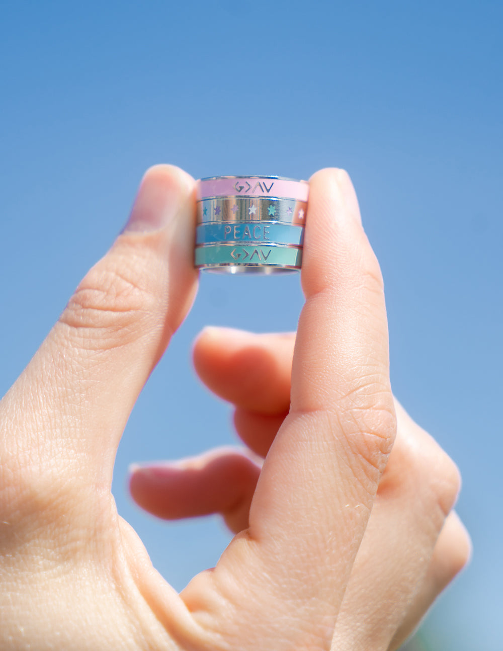 Elevated Faith Blue Enamel Peace Ring — lifestyle context