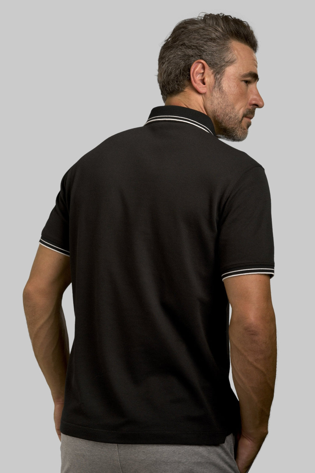 Buki Happy Polo Shirt - Black — detail close-up