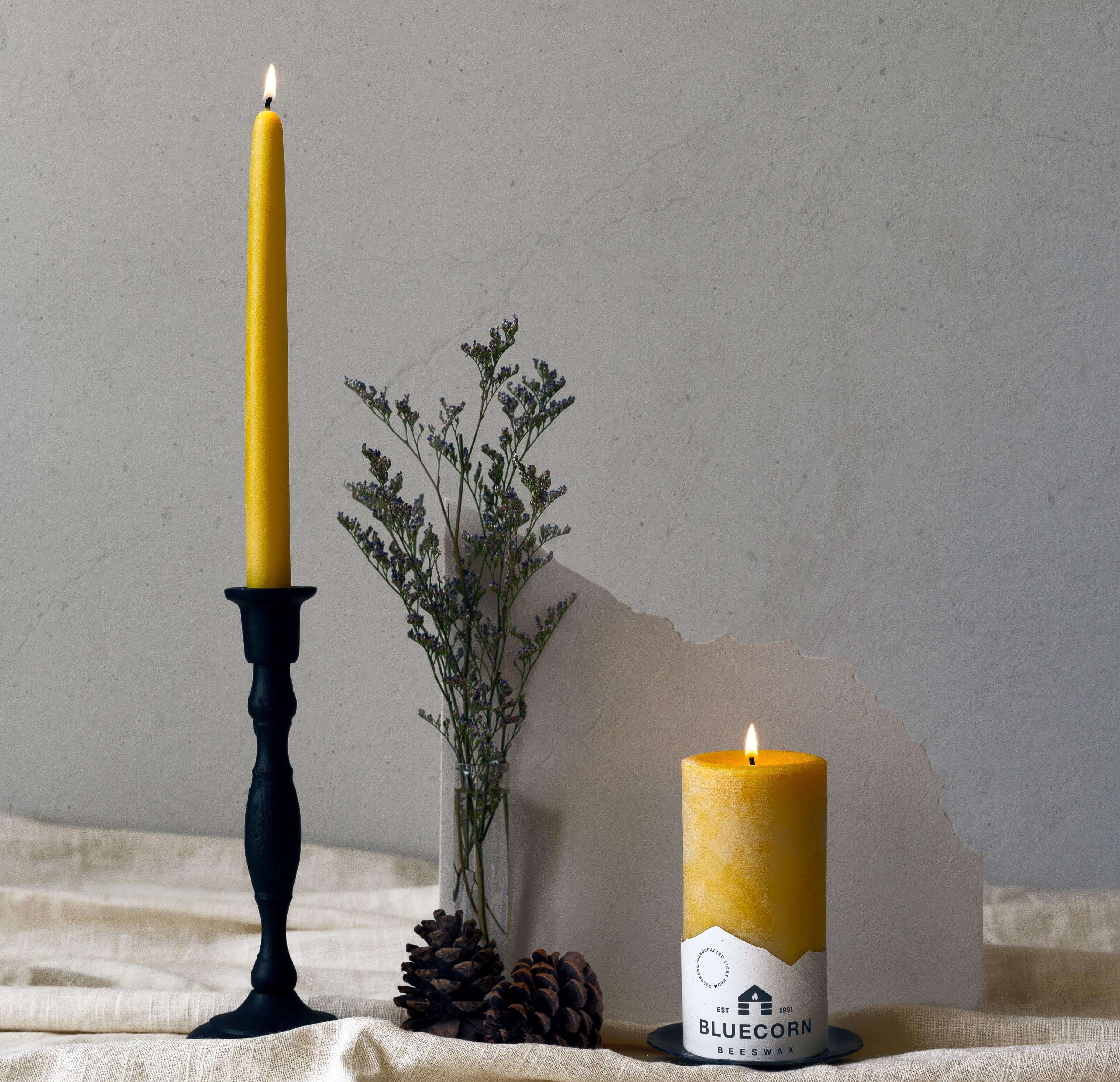 Bluecorn Candles Taper Candle Holders - Handcrafted Cast Iron — branding close-up