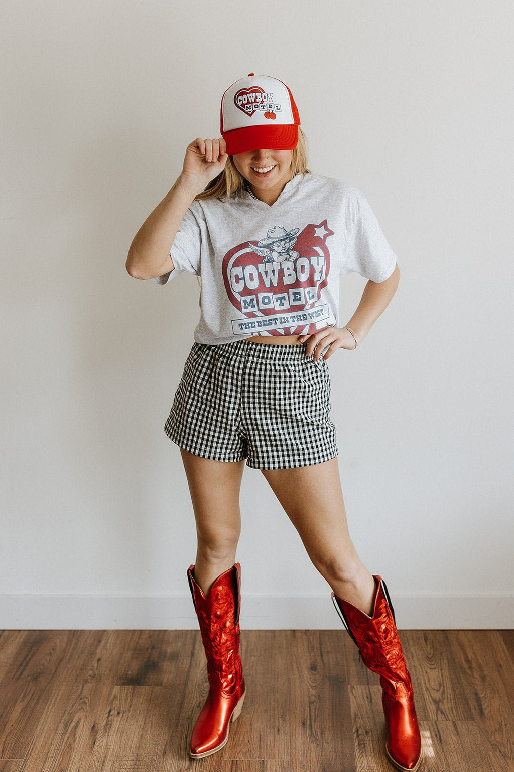 Wild Junkie Cowboy Motel Raw Cut V-neck Graphic Tee — detail close-up