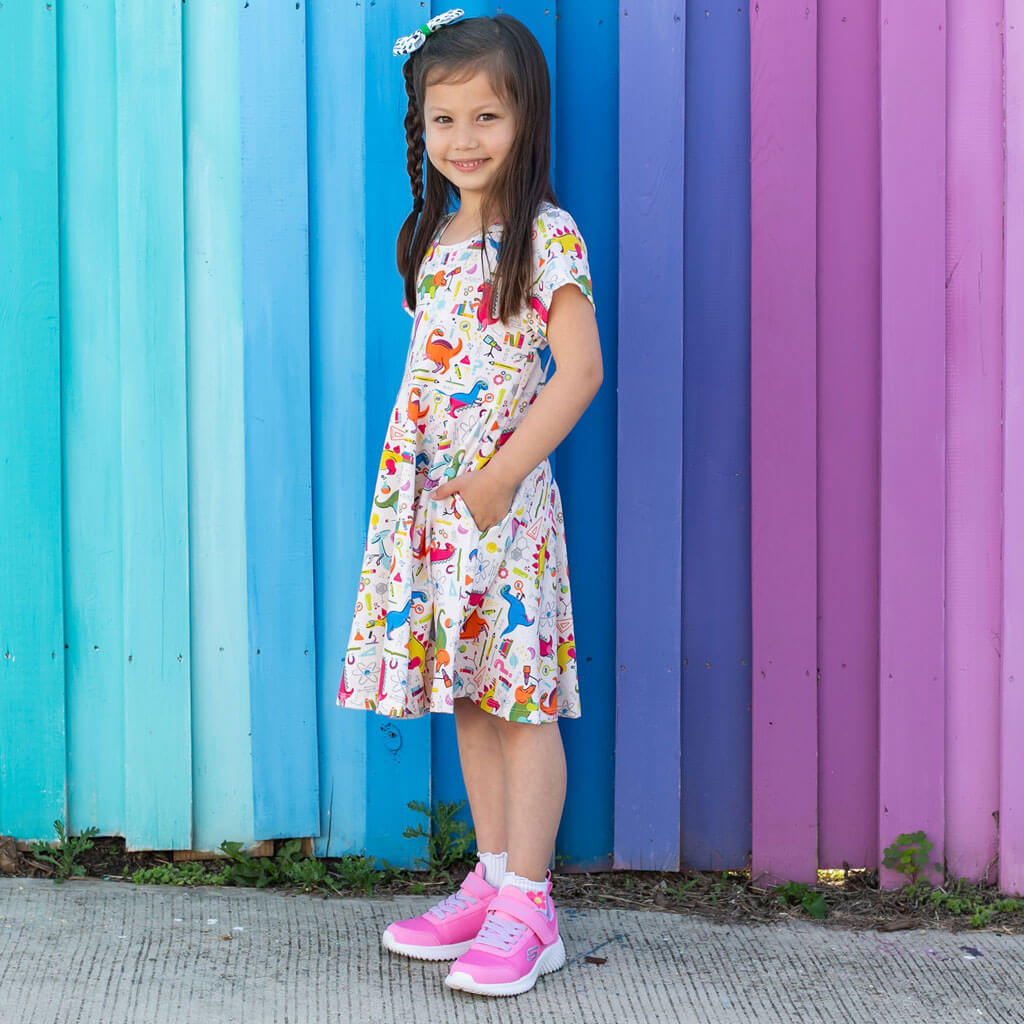 Princess Awesome & Boy Wonder "Hypothesaurus Rex" Dinosaur Scientists Super Twirler Dress with Pockets — side view
