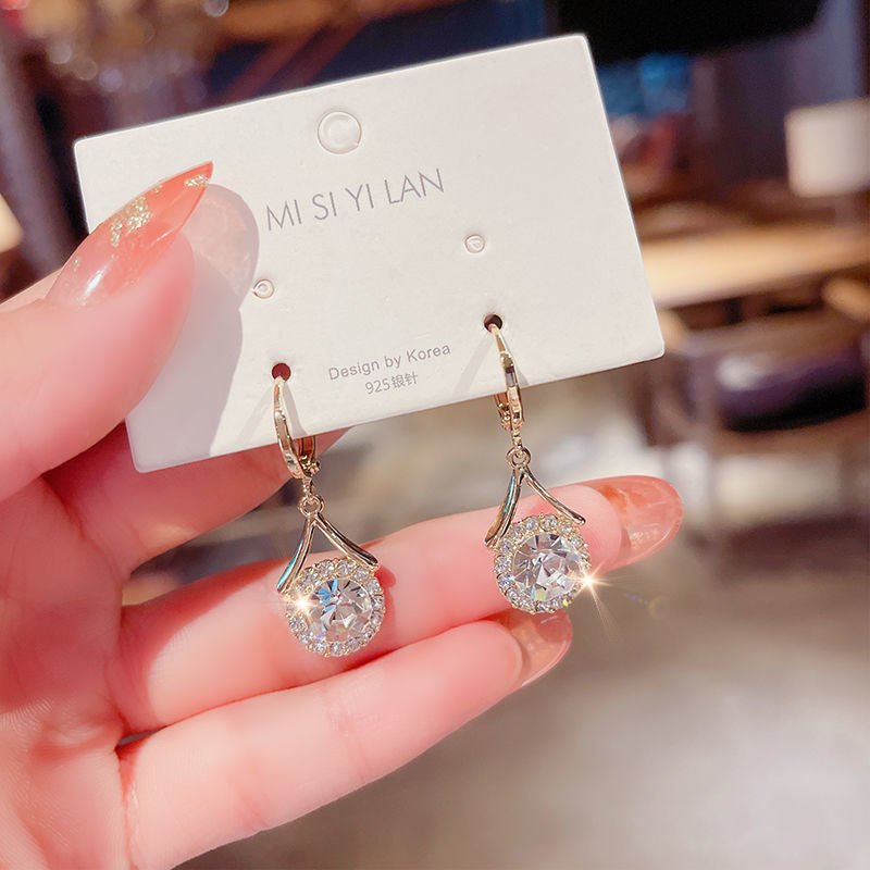 Mariam's Collection Elegant Sparkling Dangle  Rhinestone Earrings (MAC324) — lifestyle worn / used context