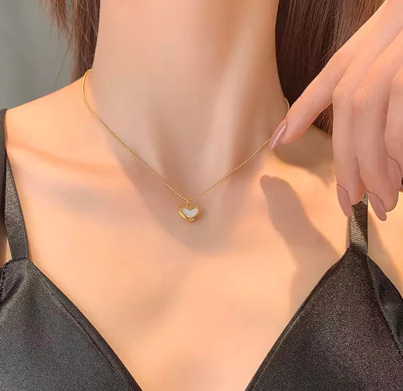 SORI STYLE Mother of Pearl Heart Pendant Necklace — lifestyle context
