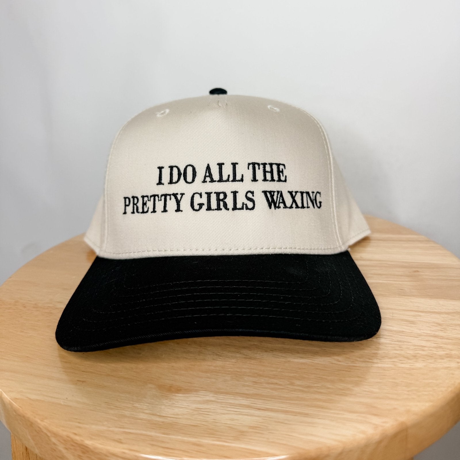 Coco & Rho I do all the pretty girls waxing- Trucker Hat — main product shot