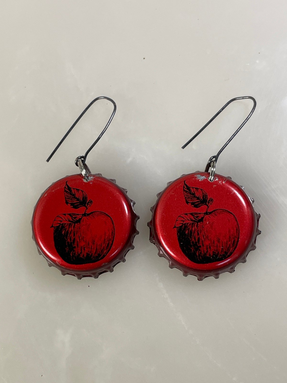 Just Neat Stuff Apple Caps — main product shot