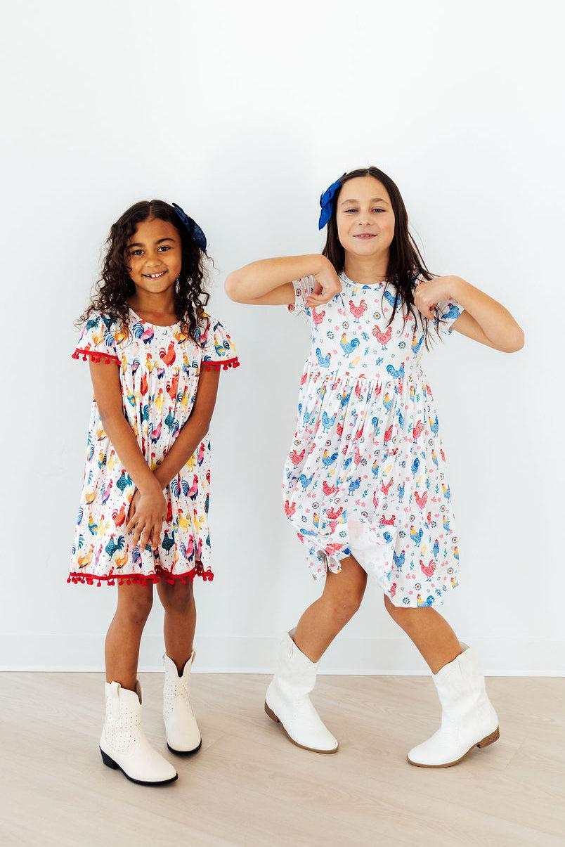 Mila & Rose ® Rainbow Roosters S/S Pocket Twirl Dress — back view