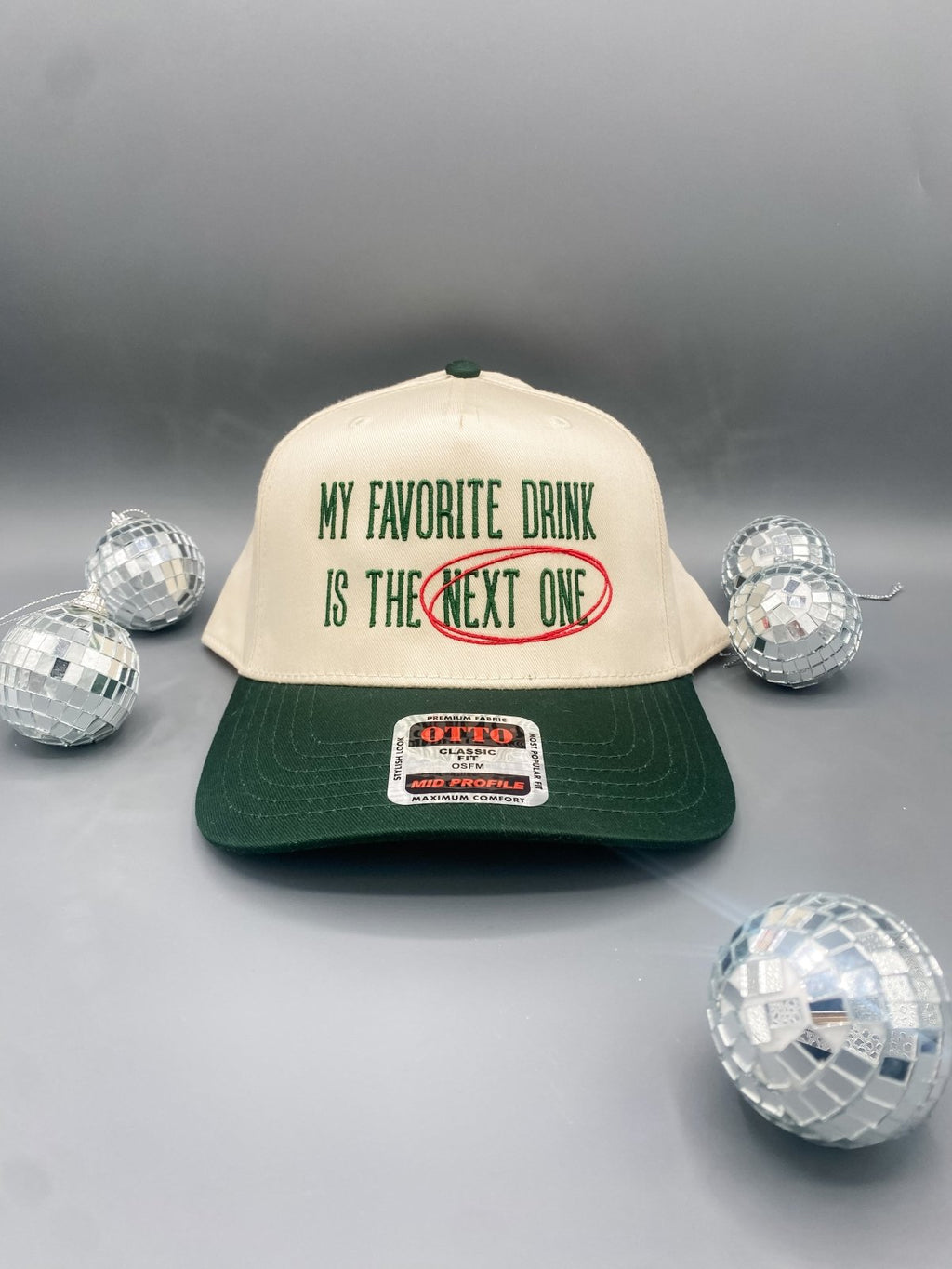 Coco & Rho My Favorite Drink Is The Next One- Trucker Hat Dark Green/Tan — main product shot