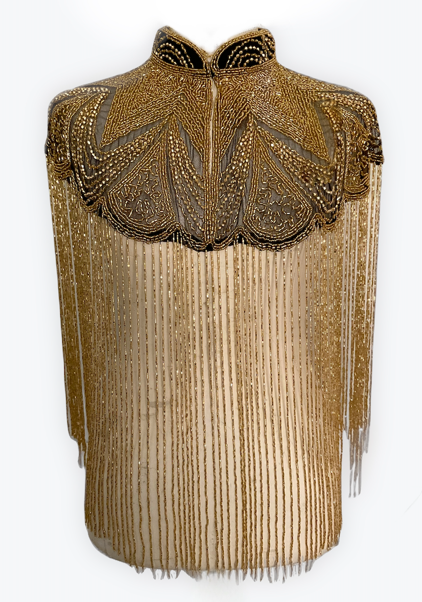 L'Jai Amor Golden Reverie Cape — lifestyle context