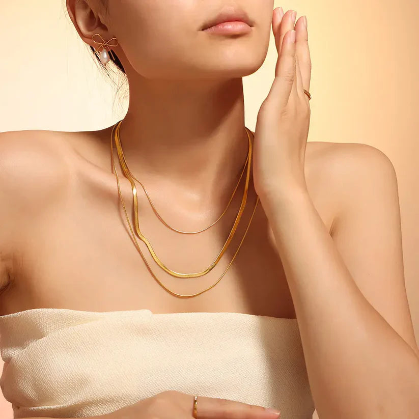 SORI STYLE Triple Layer Snake Chain Necklace — lifestyle context
