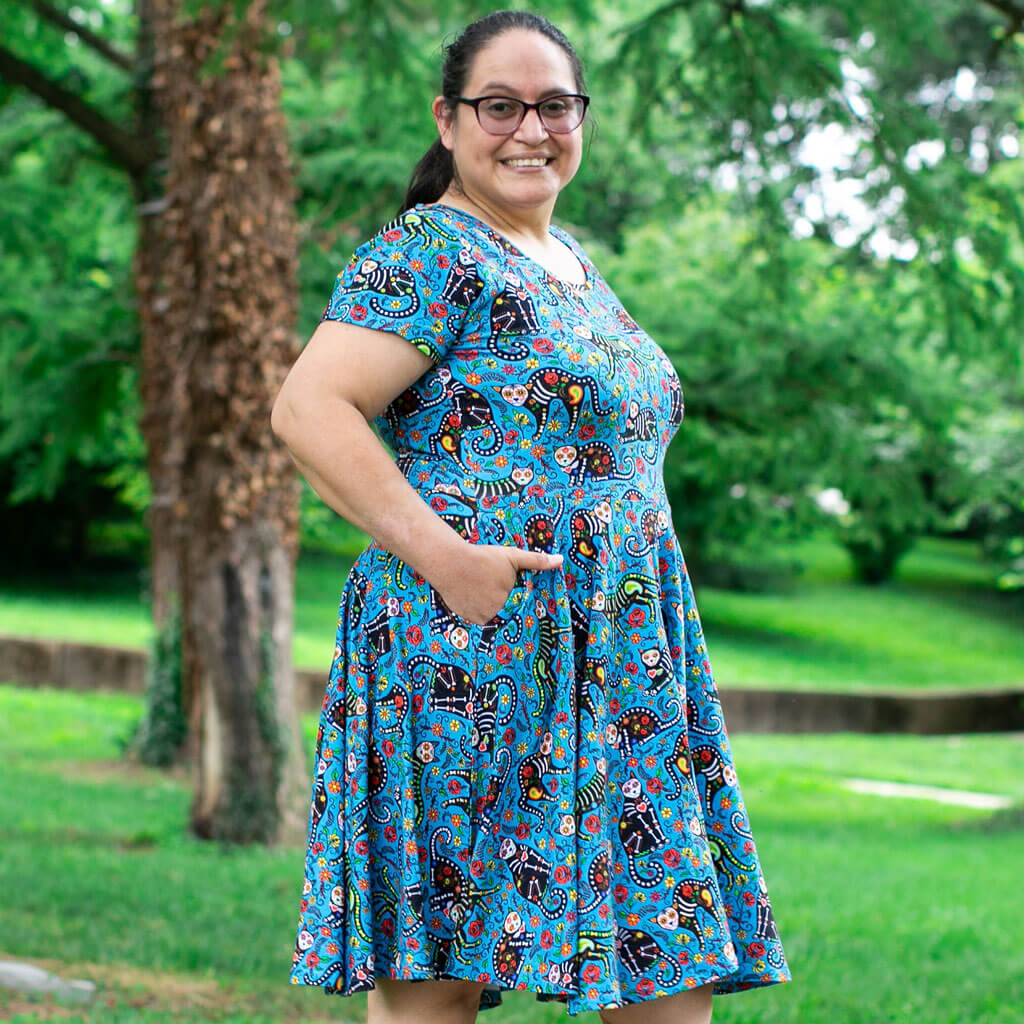 Princess Awesome & Boy Wonder Adult "Los Gatos Fantasmas" Calavera Cats Super Twirler Dress with Pockets — side view